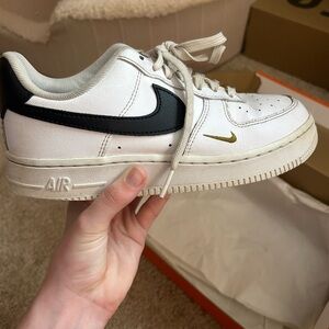 White and black air force ones